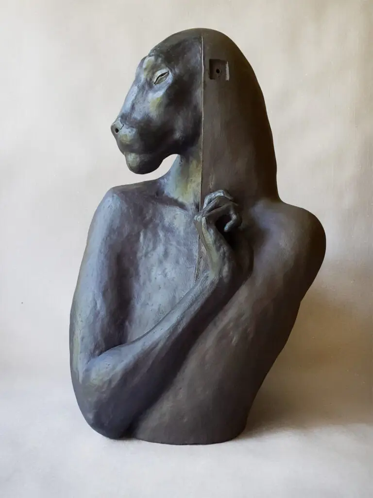 Stoneware sculpture resembling a big black antropomorphic panther